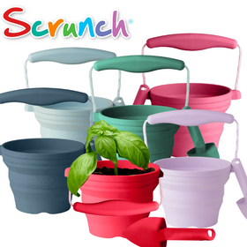 A vibrant Scrunch Mini Bucket & Spade features a colorful silicone bucket with soil and a basil plant, complete with a small red shovel. Ideal for young gardeners. "Scrunch" is displayed in bold letters at the top.