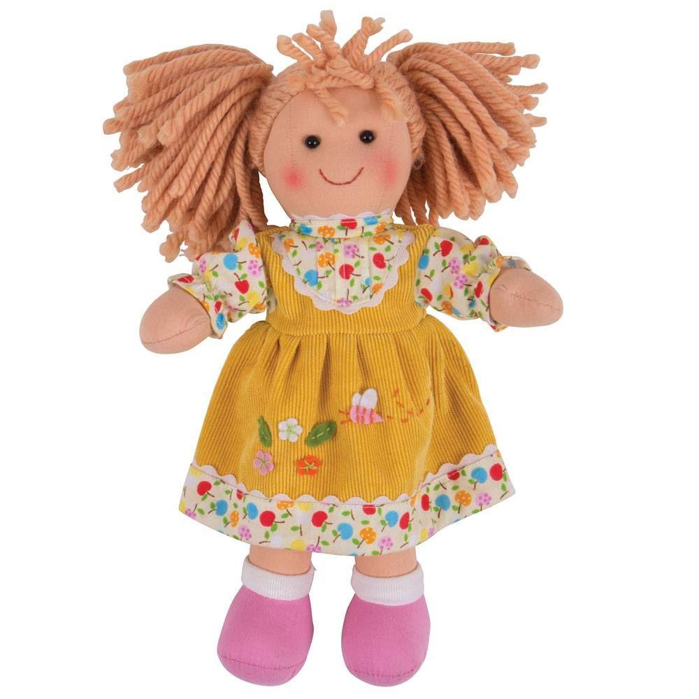 Rag doll with yellow cord pinafore dress.