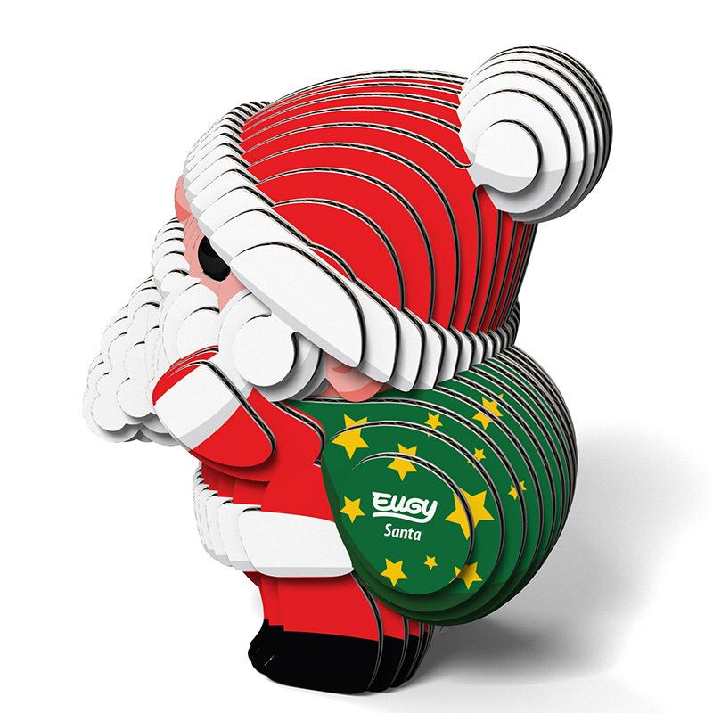 Rear view of the Eugy cardboard Santa model showing his green sack with yellow stars.