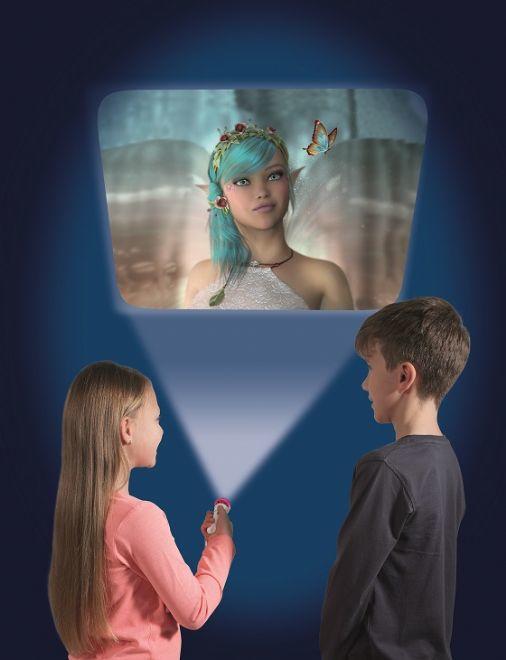 Girl and boy projecting an images of a fairy onto a wall in a dark room.