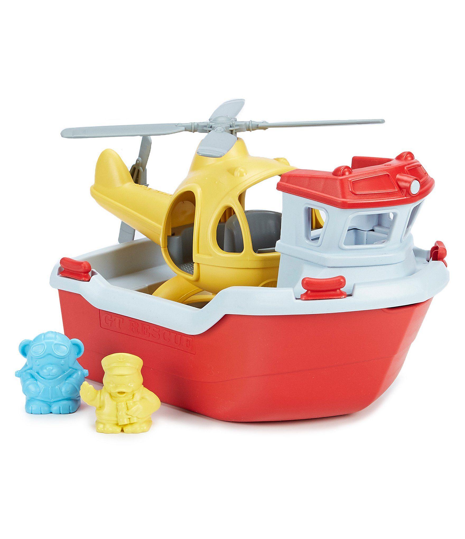 Green Toys Rescue Boat carrying a yellow helicopter.