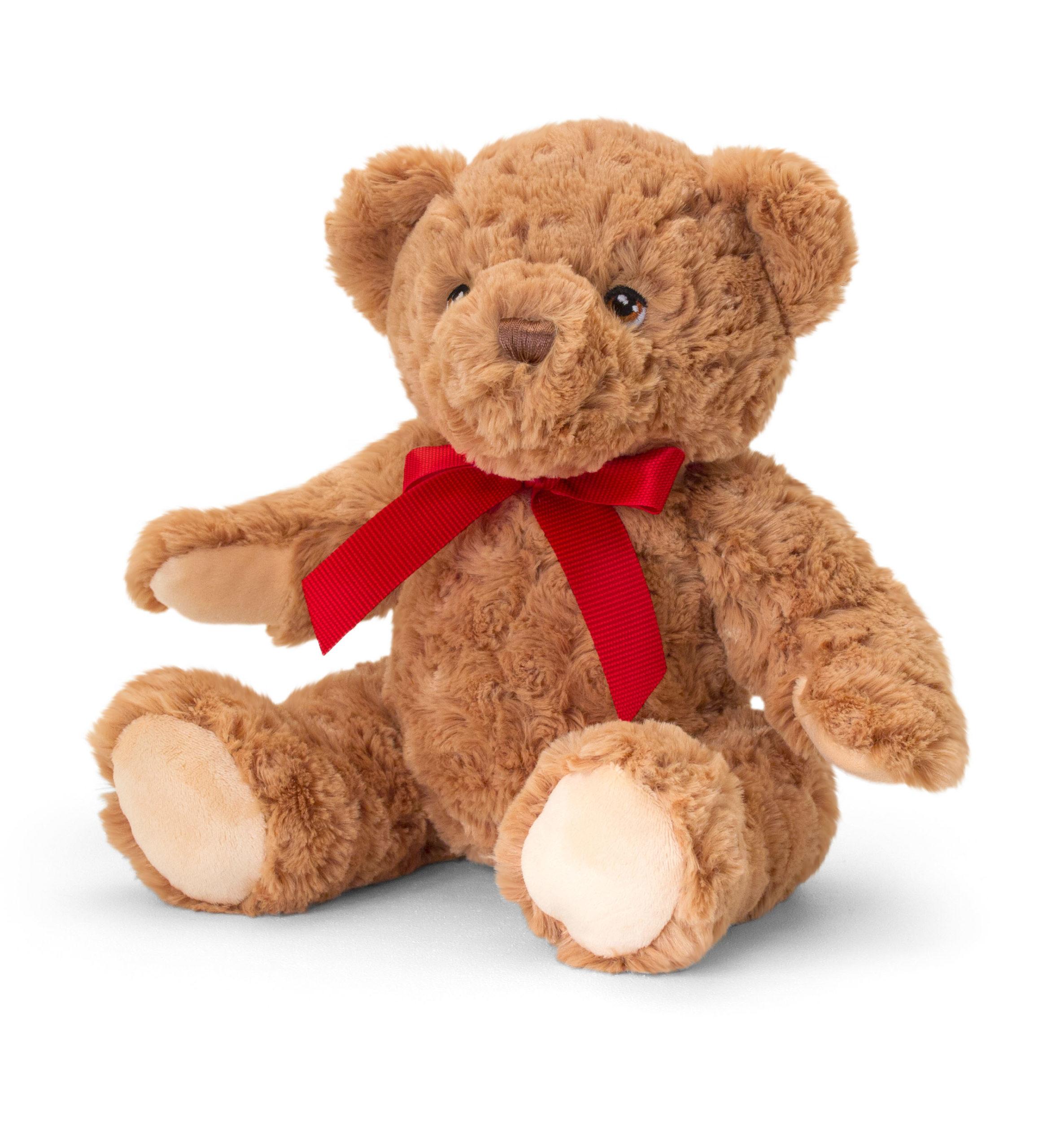 Brown, cuddly teddy with red bow around its neck.