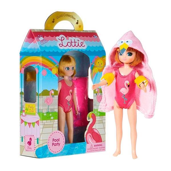 Lottie in pink swimming costume standing beside packaging.