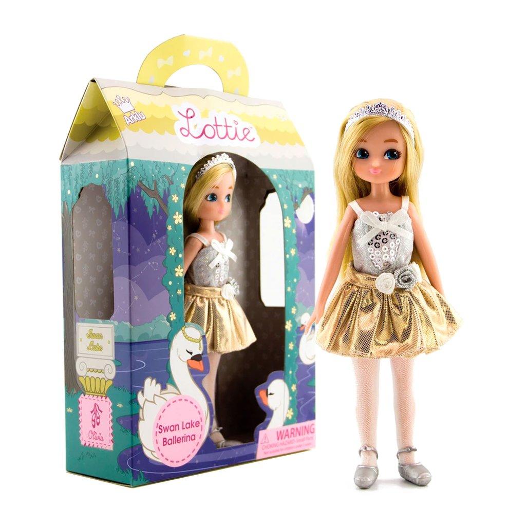 Packaging with Lottie Swan Lake doll standing in front. White background.