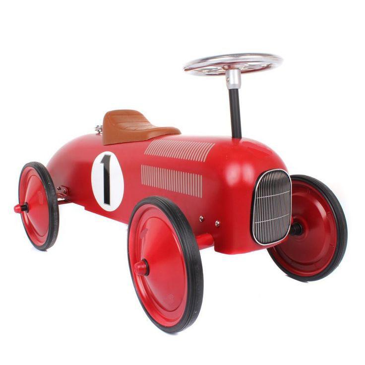 Red Vilac ride-on car front view.