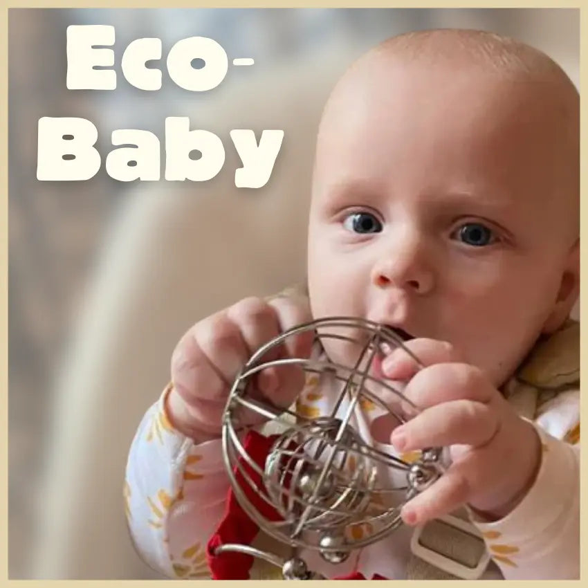 A baby with light skin holds a metallic toy while sitting. The text "Eco-Baby" is written on the left side in large, soft font.