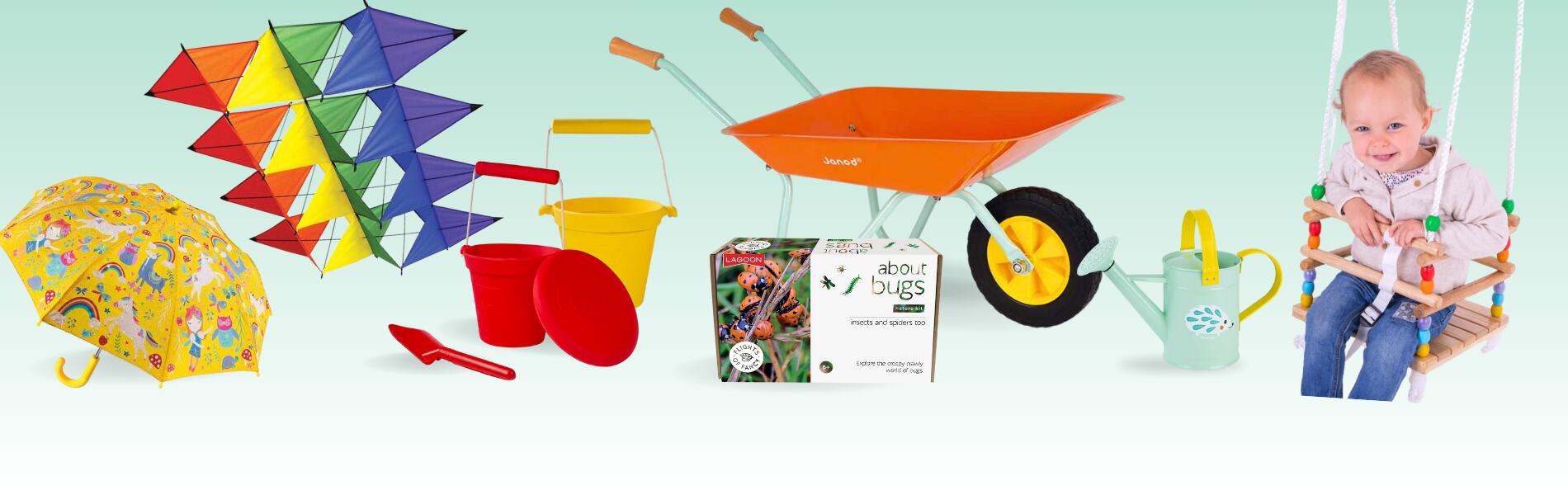 Toys for outdoor play - an umbrella, bucket & spade, wheelbarrow, compass and tree-swing.