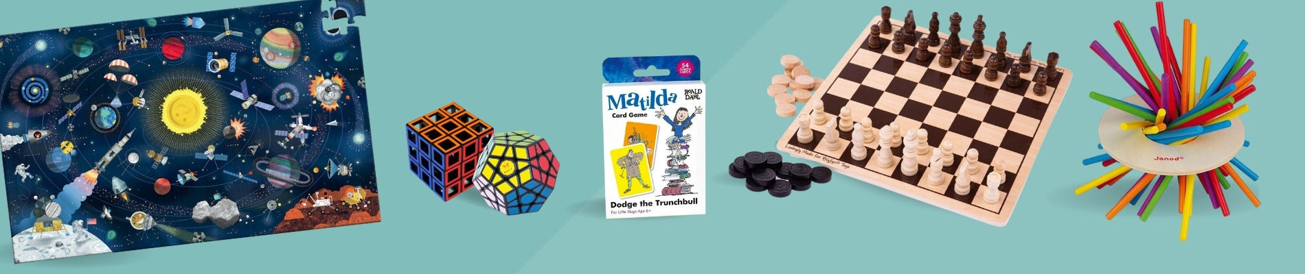 A jigsaw, cube puzzles, a Roald Dhal card game, chess set and crazy sticks game.