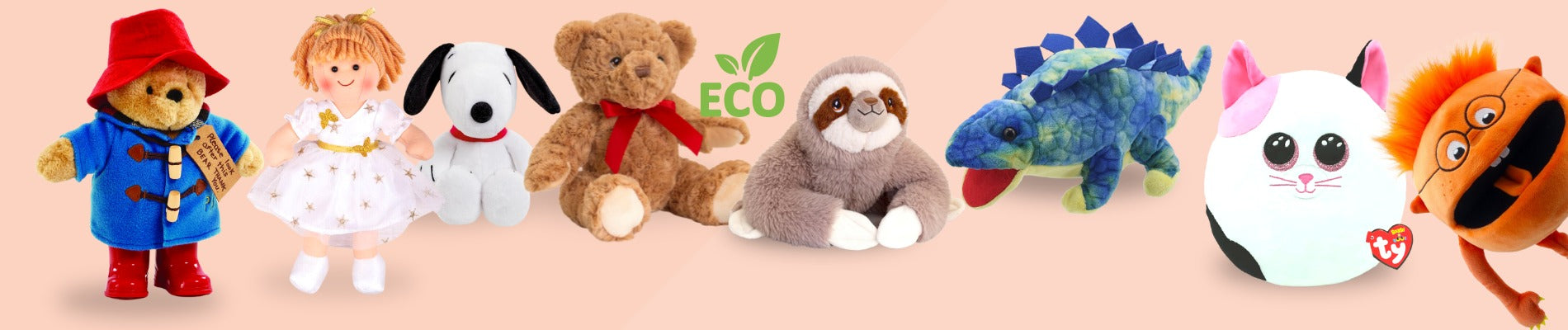 Children's soft toys and puppets with Paddington Bear on the left, rag doll, Snoopy, brown teddy, eco sloth, squishy cat, dinosaur and orange monster puppet.