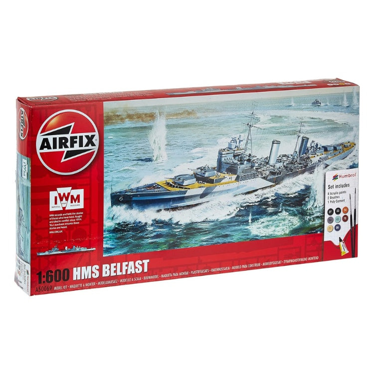 Pack containing the scale model kit of the HMS Belfast ship. White background.