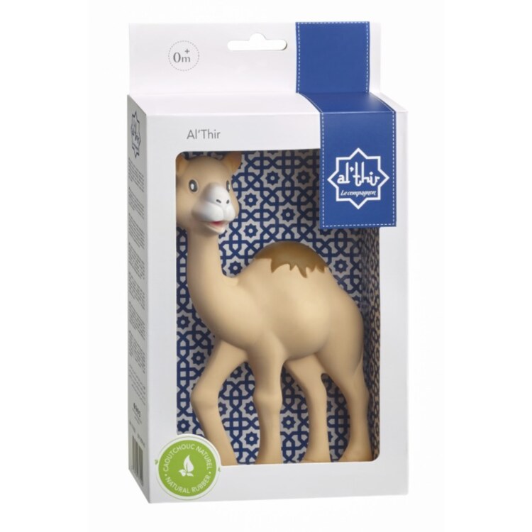 The box of "Al' Thir the Companion" teething toy from Sophie la Giraffe features a blue pattern, "0m+" details, and the iconic brand logo. A green label emphasizes its natural rubber composition for soothing teething relief.