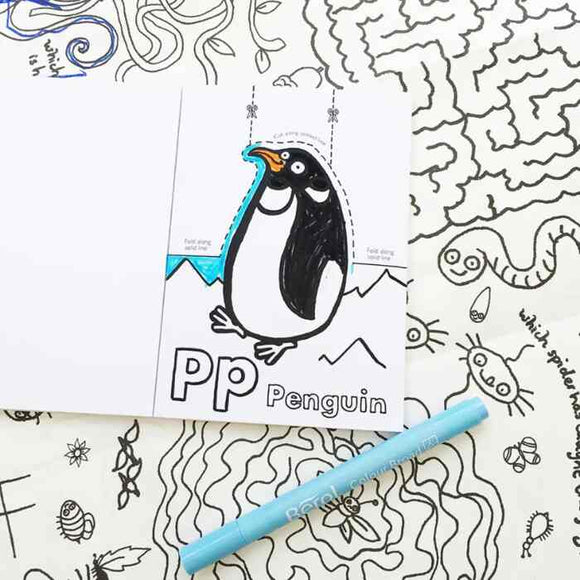 A page from the eggnogg Card Book – Pop-up Animals features a partially colored "PP Penguin" drawing, perfect for children's craft activities. A blue marker sits nearby against a background of whimsical, doodle-like patterns in black ink, inspiring young artists to color creatively.