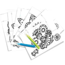 A stack of eggnogg's "Card Book - Pop Up Fairies" featuring fairies in black outlines awaits budding artists. Two colored pencils, blue and yellow, rest on top. The pages are perfect for children's parties and include floral and abstract patterns, sparking creativity at joyful gatherings.