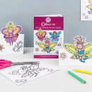 The Card Book - Pop Up Fairies by eggnogg is ideal for kids' parties, offering colored and uncolored fairy cards, colored pencils, scissors, and a "Pop Up Fairies Pocket Book: 24 Fairies to Colour In," all beautifully displayed on a white background.