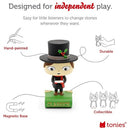 A hand-painted figure of a person wearing a top hat stands on a green base labeled "Tonie - A Christmas Carol and other Classic Stories." Inspired by timeless literature, this collectible figure from Tonies features durability, a magnetic base, and is designed for independent play.