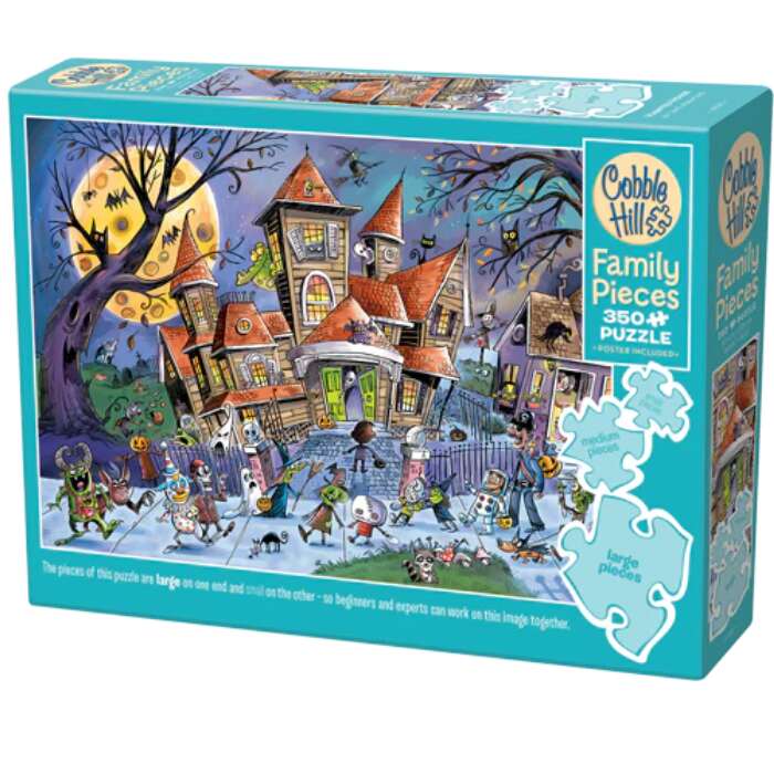 The Cobblehill Puzzles "Haunted House (350 pieces) Family Jigsaw" features a whimsical scene with playful ghosts, pumpkins, and costumed characters under a bright moonlit sky.