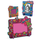 Three vibrant DIY Woodland Photo Frames by Djeco, each in different sizes and designs. The top right frame showcases a black and white photo of a smiling child. These frames are adorned with playful decorations, including stars, leaves, and butterflies in lively colors, evoking a fun and creative experience.
