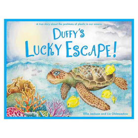 The "Duffy's Lucky Escape" book cover, by Ellie Jackson, shows a sea turtle swimming near vibrant coral and yellow fish, emphasizing ocean plastic's impact on natural habitats.