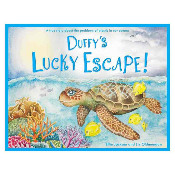 The "Duffy's Lucky Escape" book cover, by Ellie Jackson, shows a sea turtle swimming near vibrant coral and yellow fish, emphasizing ocean plastic's impact on natural habitats.
