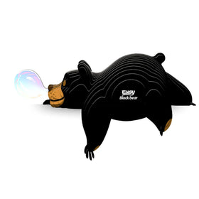 A cartoon black bear with a brown face and “EUGY Black Bear” on its side playfully blows a shiny bubble, making this EUGY puzzle fun and educational decor for kids’ rooms.