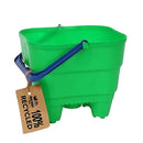 The Crazy Coast Eco 100% Recycled Castle Bucket, with a blue handle and brown tag reading "100% Recycled," is crafted from eco-friendly materials, making it an ideal children's product.