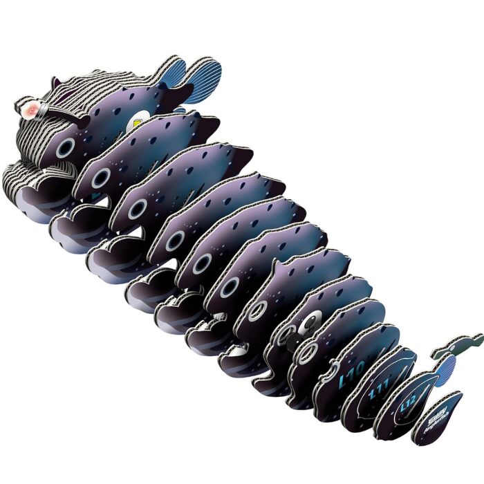 A whimsical sculpture called the EUGY Anglerfish is cleverly crafted from stacked, curved, black and blue metal plates. Each section has unique patterns and details, while the head features a pink-tipped antenna and eyes, reminiscent of EUGY figures in its playful design.