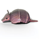 A 3D model of an armadillo features a metallic, segmented shell design set against a white background. Made from sustainable materials, this armadillo showcases a textured surface and is marked with "EUGY Armadillo" on its side.