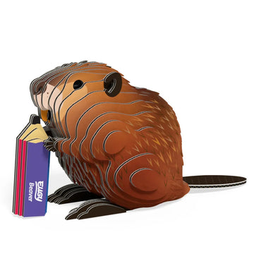 The EUGY Eugy Beaver is a 3D paper sculpture collectible featuring a beaver with brown textured fur, a flat tail, and a colorful stick labeled "Beaver," all made from eco-friendly materials and displayed on a white background.