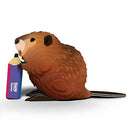 The EUGY Eugy Beaver collectible features a cartoon beaver with brown, textured fur and a flat, striped tail, holding a large purple and yellow "Easy" pencil in its front paws. Set against a white background.