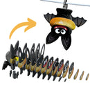 The EUGY Bat by EUGY is depicted as a toy crafted from stacked layers of eco-friendly paper or cardboard. An arrow directs attention to the bat hanging upside down on a rod, with the layered design creating an illusion of the bat flying toward the viewer, emphasizing its sustainable materials.