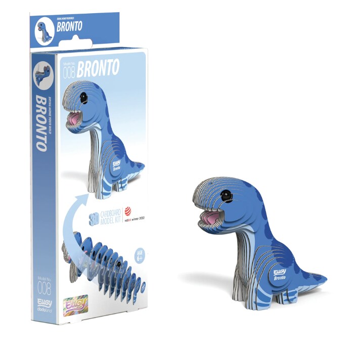 The image features a cardboard model kit called "EUGY Bronto" by the brand EUGY. The box displays an illustration of the assembled 3D craft Brontosaurus next to its biodegradable card packaging. This toy, complete with non-toxic glue, is designed for children aged 4 and up.