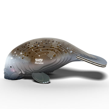 The EUGY Manatee by EUGY features a cartoon-like manatee model with constellation patterns on a white background to promote ocean conservation. The design showcases smooth gray contours and the word "Manatee" near the pattern.