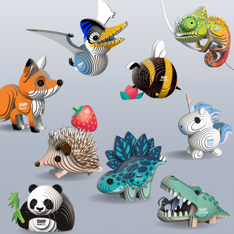 A collection of Eugy model animals including a panda, dinosaur, unicorn and alligator.