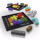 Two grids from The Happy Puzzle Company's "The Genius Square" board game feature vibrant blocks, dice, and scattered letters and numbers. They invite players into a challenging world of clever moves and strategic thinking.