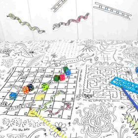 The Giant Poster / Tablecloth – Puzzletime by eggnogg features intricate, hand-drawn maze and game designs with snakes, ladders, and colorful dice. This black and white tablecloth doubles as a durable paper colouring-in poster, making it perfect for children's parties, where a blue pen is ready for eager artists to start their adventure through the maze.