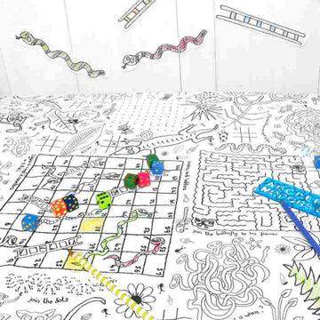 The Giant Poster / Tablecloth – Puzzletime by eggnogg features intricate, hand-drawn maze and game designs with snakes, ladders, and colorful dice. This black and white tablecloth doubles as a durable paper colouring-in poster, making it perfect for children's parties, where a blue pen is ready for eager artists to start their adventure through the maze.