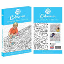 The "eggnogg Giant Poster / Tablecloth – Seaside" packaging displays a child coloring an ocean-themed design. Versatile as a seaside poster, playmat, or party centerpiece with "Happy Holidays!" text, it's ideal for children's parties.