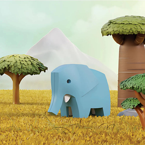 The Halftoys Diorama - Elephant by Halftoys features a blue, cartoon-style educational elephant toy in a yellow grassy field with stylized trees, a white mountain, and a pale sky in the background.