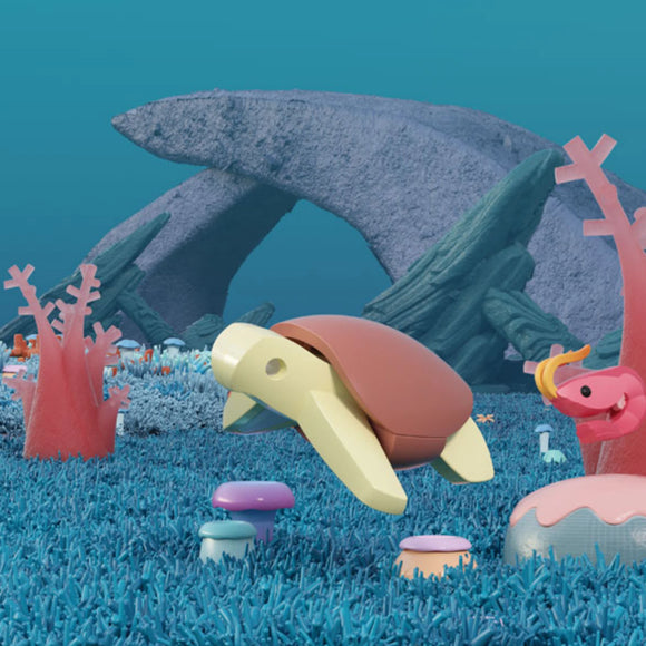 A 3D-rendered underwater scene features a Halftoys Diorama - Green Turtle swimming among vibrant coral, mushrooms, and plants with large rocks behind it and a pink seahorse to the right in this ocean-themed playset by Halftoys.