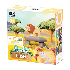 The Halftoys Diorama - Lion by Halftoys is a magnetic 3D puzzle for ages 3+, featuring a lion and trees in a savanna scene. The box shows illustrated instructions and product images.