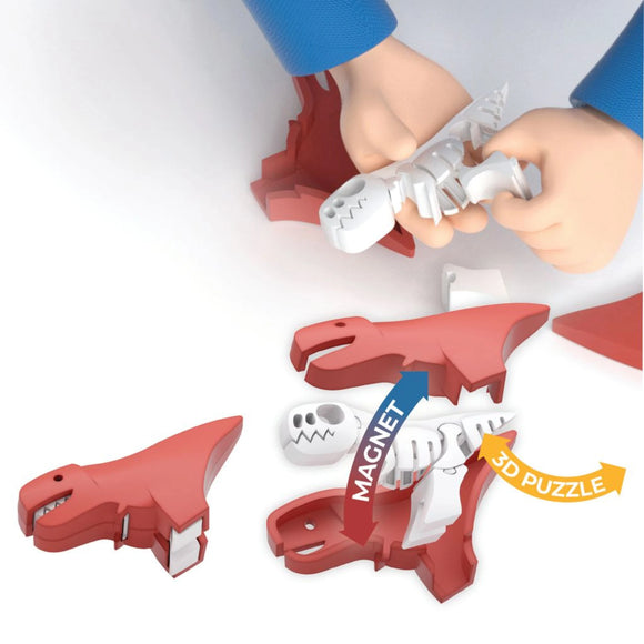 A person’s hands assemble the Halftoys Diorama - T-Rex by Halftoys, an educational red and white 3D dinosaur puzzle with internal skeleton pieces fitting into red shells, labeled "MAGNET" and "3D PUZZLE," for a fun STEM playset.