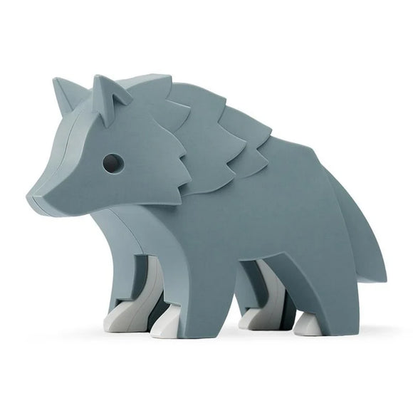 The Halftoys Diorama - Wolf by Halftoys is a minimalist, blue-gray layered wolf figurine with smooth, simple features—ideal for woodland-themed playsets or as an educational toy to inspire creative learning.