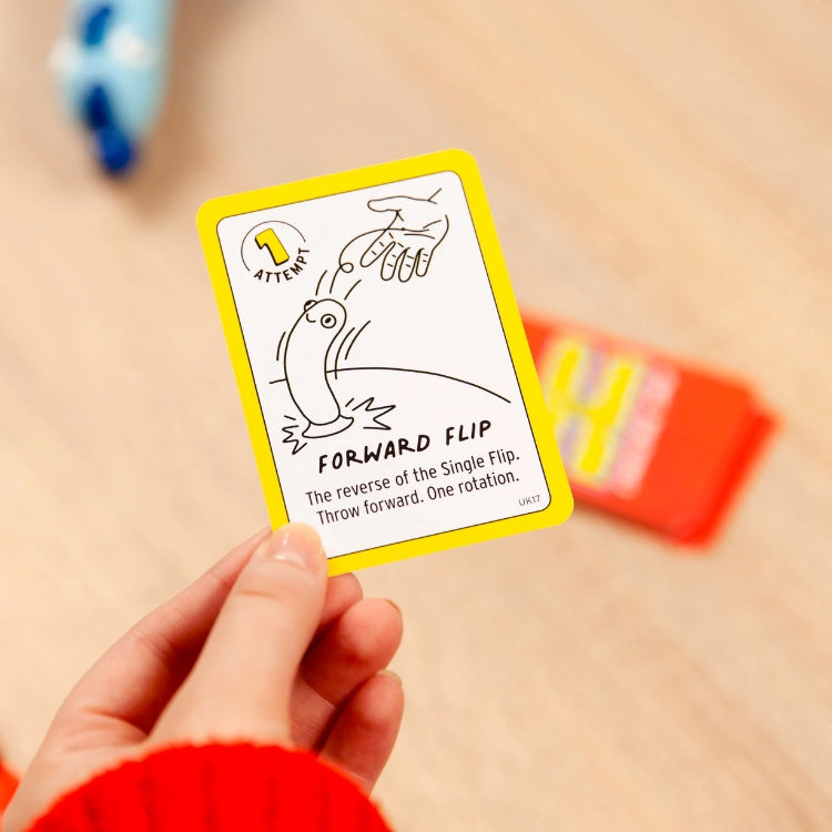 Playing card from the Chicken vs Hot Dog game. Text reads: "Forward Flip - The reverse of the Simple Flip. Throw forward. One rotation."