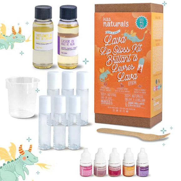The DIY Natural Lava Lip Gloss Kit by KISS NATURALS is showcased with a variety of components, all crafted from all-natural ingredients. The kit includes bottles of sunflower and castor oil, a mixing cup, a wooden stir stick, several empty lip gloss tubes, and small bottles of colorant. The backdrop features whimsical dragon illustrations.
