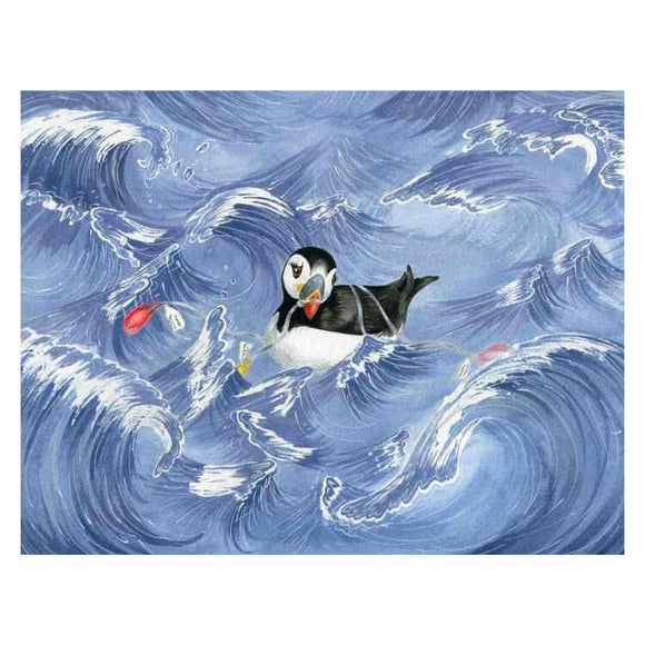 In Ellie Jackson's "Marli's Tangled Tale," a puffin navigates stylized blue waves with white crests, skillfully dodging ocean plastic while carrying small fish in its beak. The vibrant art captures the dynamic motion of the ocean and the puffin's sleek black and white plumage.