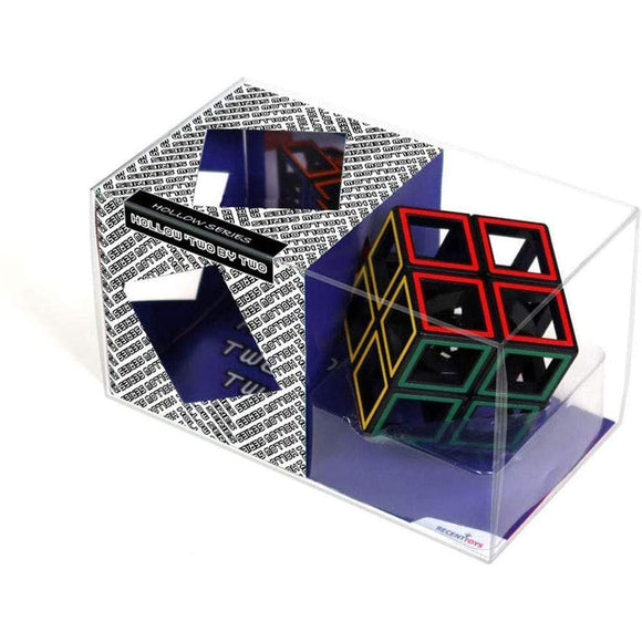 A Meffert - Hollow 2 x 2 Cube Puzzle from MEFFERT'S PUZZLES, featuring black edges and colorful outlines, is displayed inside clear plastic packaging adorned with a patterned label. The box has a partially open side revealing part of the twisty puzzle. The logo "TUTU" is visible on the package.