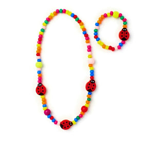 The molly & rose Ladybird Wooden Bead Necklace and Bracelet Set features a vibrant design with multicolored beads and charming ladybug-shaped beads, making it an ideal addition to party bags.