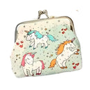 The molly & rose Unicorn Print Coin Purse features a charming design with three unicorns adorned in bold pink, blue, and orange manes. Set against a light background with stars and hearts, it makes for ideal stocking-fillers this festive season.