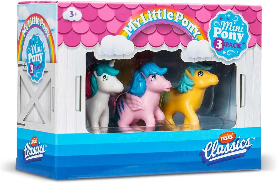 The My Little Pony Mini Classics (2") by Basic Fun includes a white, pink, and yellow pony with colorful manes in a barn-like, pink-roofed box. Perfect for ages 3+, this collectible 3-pack is ideal for young fans and collectors.