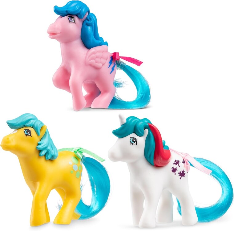 Three 2" My Little Pony Mini Classics by Basic Fun feature a pink pony with blue hair and wings, a yellow pony with turquoise hair, and a white pony with red and teal hair, each displaying unique side markings.